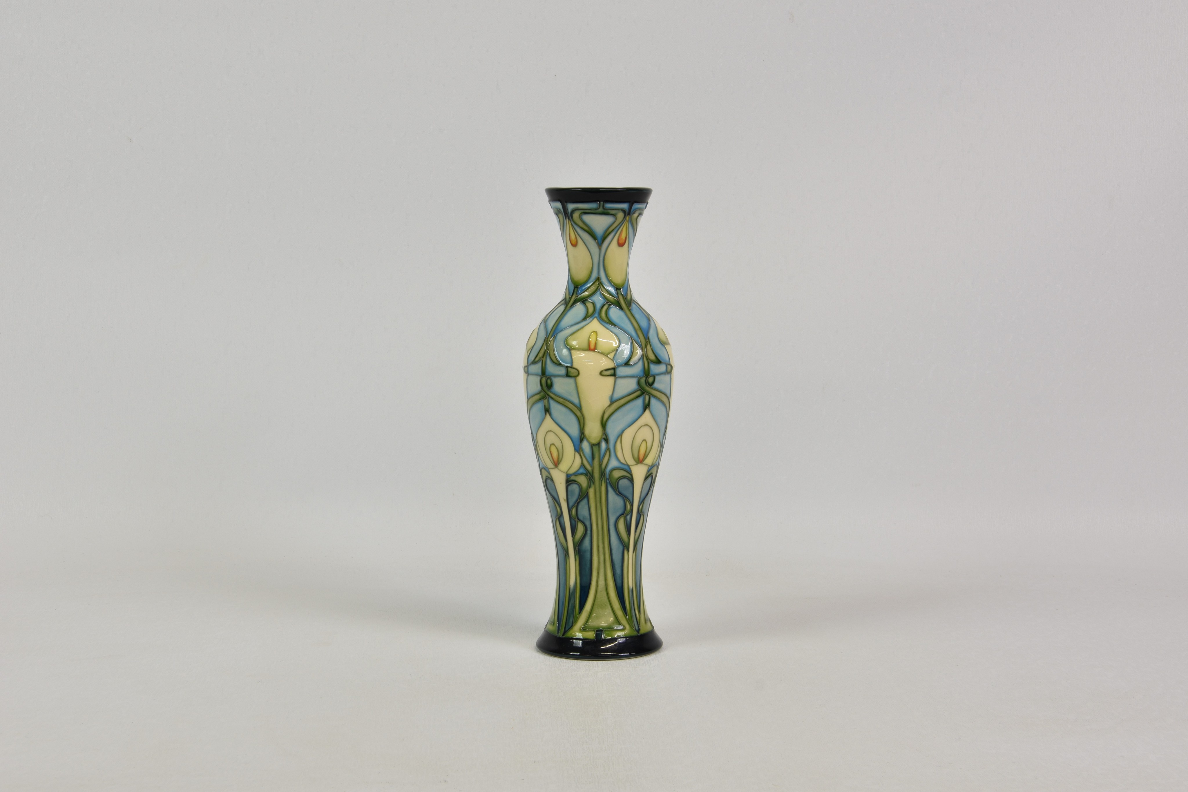 A Moorcroft Pottery Prestige vase, decorated in the Calla Lily pattern designed by Emma Bossons,