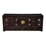 A Chinese dark stained elm low cabinet, probably Qing Dynasty, mid-19th century, the central two