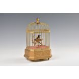 A German gilt metal singing bird automaton, early 20th century, marked 'K.G' for Karl Griesbaum,