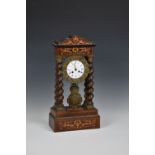 A 19th century French rosewood, faux-rosewood and marquetry portico clock by Troup à Paris, the