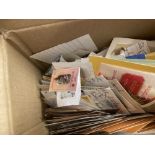 STAMPS - Three small boxes of stamps on stock cards and loose,
