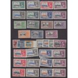 STAMPS 1935 SILVER JUBILEE, two stock pages with 14 U/M or lightly M/M sets, plus two used sets.