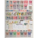 STAMPS WORLD, two stockbooks with many 100s mint or used with some useful GB, British Commonwealth,