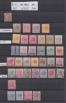 STAMPS BRITISH COMMONWEALTH mint and used in burgandy stockbook, Malaya, India all pre QEII.