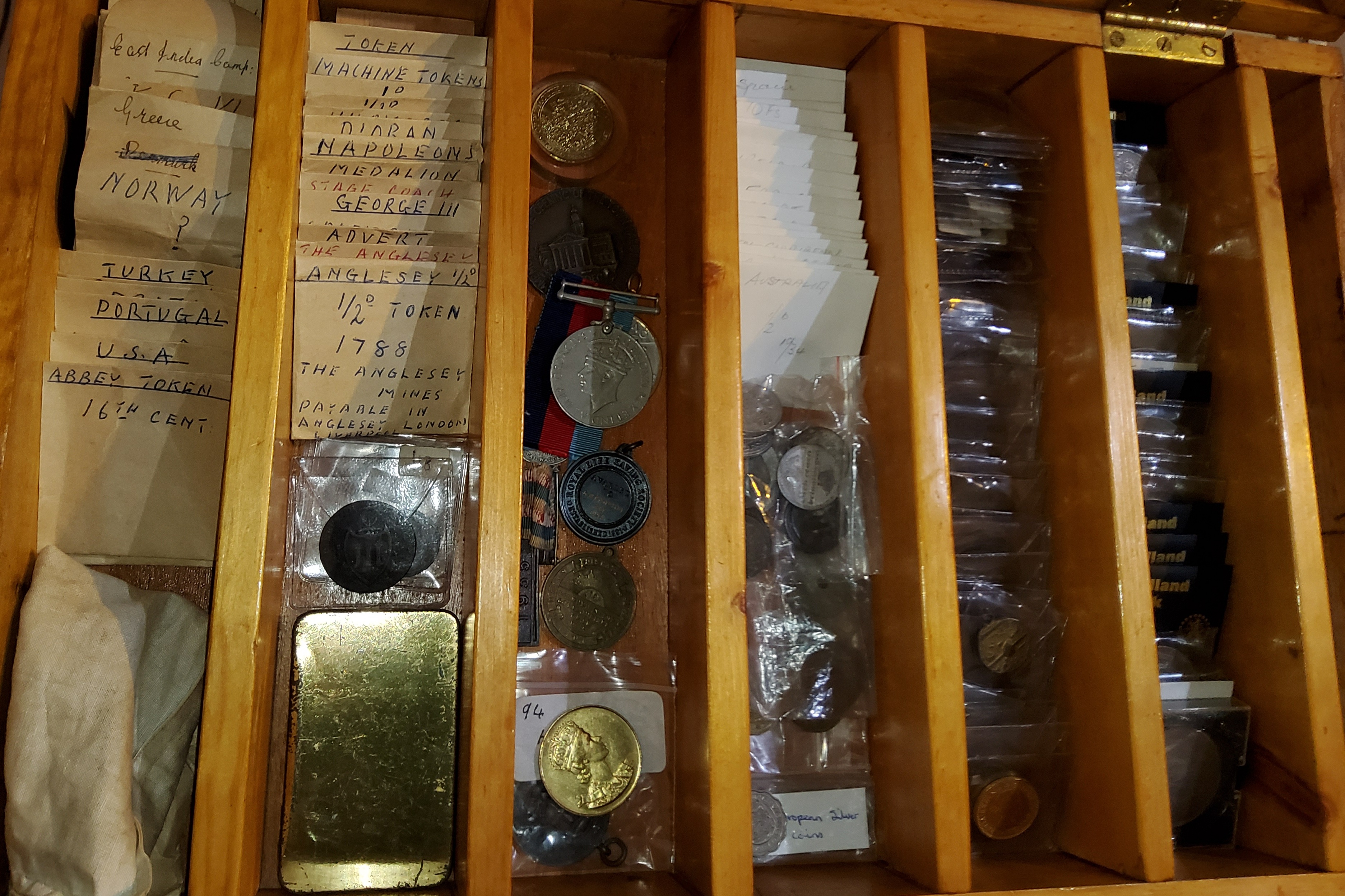 A mixed lot of medals; tokens; etc.