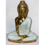A modern Buddha figure in the lotus position, in gold lustre and white pottery, height 46 cm