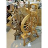 A 19th century spinning wheel reproduction spinning wheel with treadle action