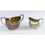 A milk jug and sugar bowl in Georgian fluted oval style, Chester 1923, 13 oz