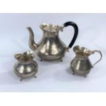 A white metal tea service in continental style, stamped silver to base.