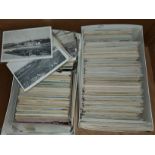 Two albums of vintage postcards; a large collection of loose cards