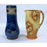 A 1930's Burleigh ware "Honeycomb " jug, height 22 cm; a Royal Doulton baluster stoneware vase