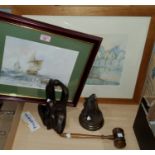 A watercolour of a lake, a watercolour of ships at sea, 2 bronze effect sculptures and a gavel