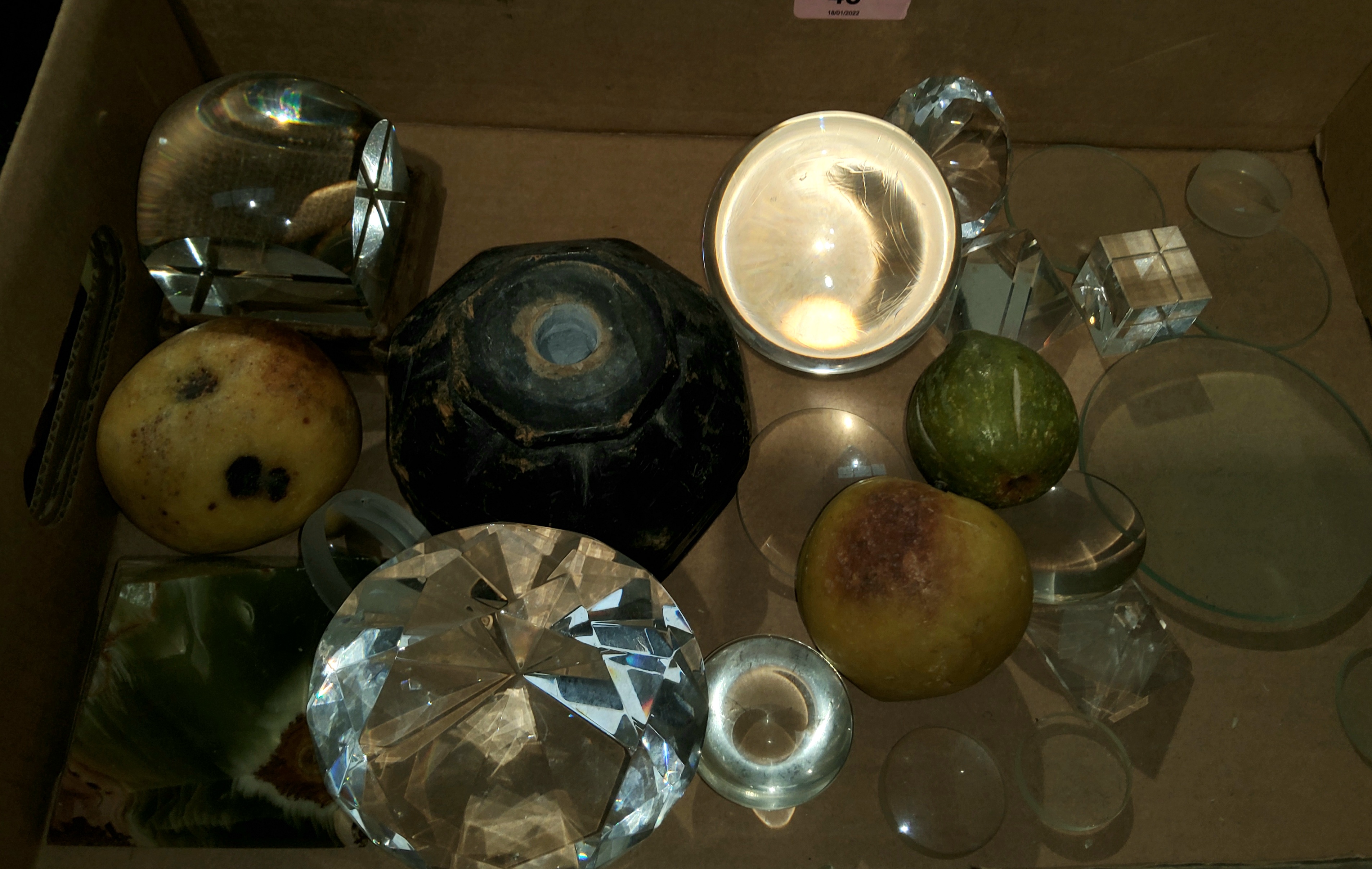 A 19th century crystal ball and stand; other glass items; 3 ceramic fruits