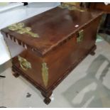 An impressive reproduction continental style chest with hinged lid with large brass hinges,