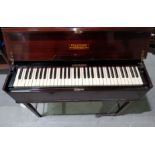 A Dulcitone keyboard instrument in mahogany case, by Thomas Machell & Sons, 97 cm