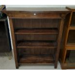 An oak 'Minty' style 3 height sectional bookcase; an oak 3 height bookcase