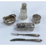 A hallmarked silver capped scent bottle, a hallmarked silver and glass trinket box, other pieces