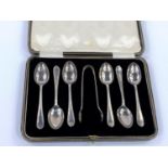 A hallmarked silver set of 6 teaspoons and tongs, cased, Sheffield 1924, 3 oz