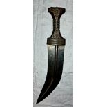 A Middle Eastern curved blade horn handle and white metal mounted ceremonial dagger, length 30cm