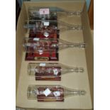 Five glass historical ships in glass bottles, 3 Santa Maria, a Spanish galleon and a Spanish Man O'