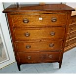 An Edwardian mahogany chest of 4 long drawers, with satinwood crossbanding