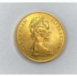 A 1973 Isle of Mann 22 carat gold sovereign with Norse Warrior to obverse, 7.96gm, Pobjoy Mint