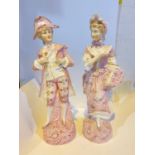 A pair of 19th Century 'Chantilly' bisque figures in 18th century dress