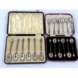 A set of silver coffee bean spoons, cased; another cased set; another set;  total weight 5. oz