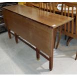 A 1960's teak side/dining table with single drop leaf