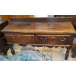 A small18th century oak dresser base with 2 frieze drawers with later handles on turned front
