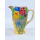 A 1940's Clarice Cliff jug decorated with pansies and dripware, black printed mark for Newport