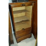 A 1930's oak filing cabinet with tambour front, 48 cm