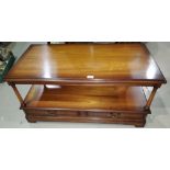 A mahogany period style 2 tier coffee table with rectangular top and 2 drawers to base