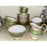 A Copeland Spode Arundel part tea service in gold and green