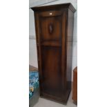 A 1930's oak hall wardrobe; a small 3 height chest of drawers similar