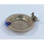 An Australian silver plated ash tray with kangaroo and an enamel badge for Benalla