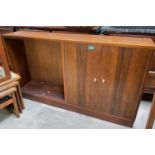 A 1950's walnut bookcase/side cabinet by Morris of Glasgow