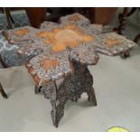 A Chinese carved occasional table with squared top decorated with vines etc