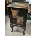 A late 19th/early 20th century ebonised pot cupboard with gilt moulding and scrapwork decoration,