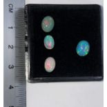 Four oval cabochon cut opals, 2.88 carats total