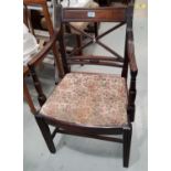 A Regency period Cuban mahogany carver chair withy 'X' frame back, on reeded legs; a matching dining