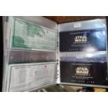 An album of a large quantity of phone cards including Star Wars and other examples