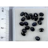 Twenty small oval cut dark blue sapphires, gross 8.39 crats