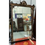 A 19th century full length rectangular mirror in Aesthetic style ebonised and parcel gilt frame,