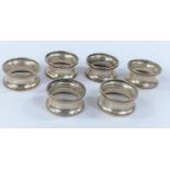 A set of six beaded hallmarked silver napkin rings, Birmingham 1919 (2.3oz)