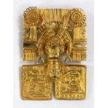 A large yellow metal "Aztec" brooch/pendant depicting a grotesque face mask, marked indistinctly,