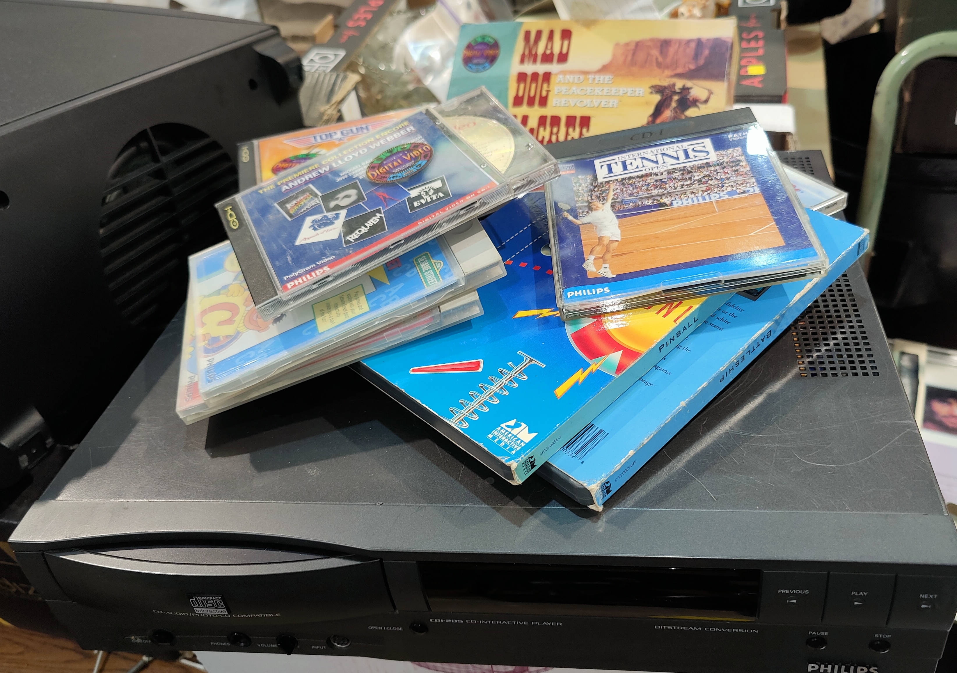 A vintage CD-1 games machine and games.