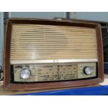 A BUSH bakelite brown mottled radio (one dial a.f); and an Ecko radio (a.f)