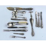 A selection of silver handled and other decorative cutlery.