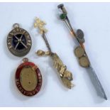 An unusual Victorian gilt metal cloak pin; various hat pins, a hallmarked silver Masonic locket "